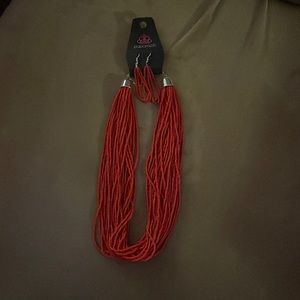 Red necklace and earrings